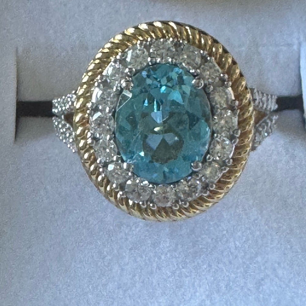 Elegant Gold and Silver Ring with Blue Gemstone